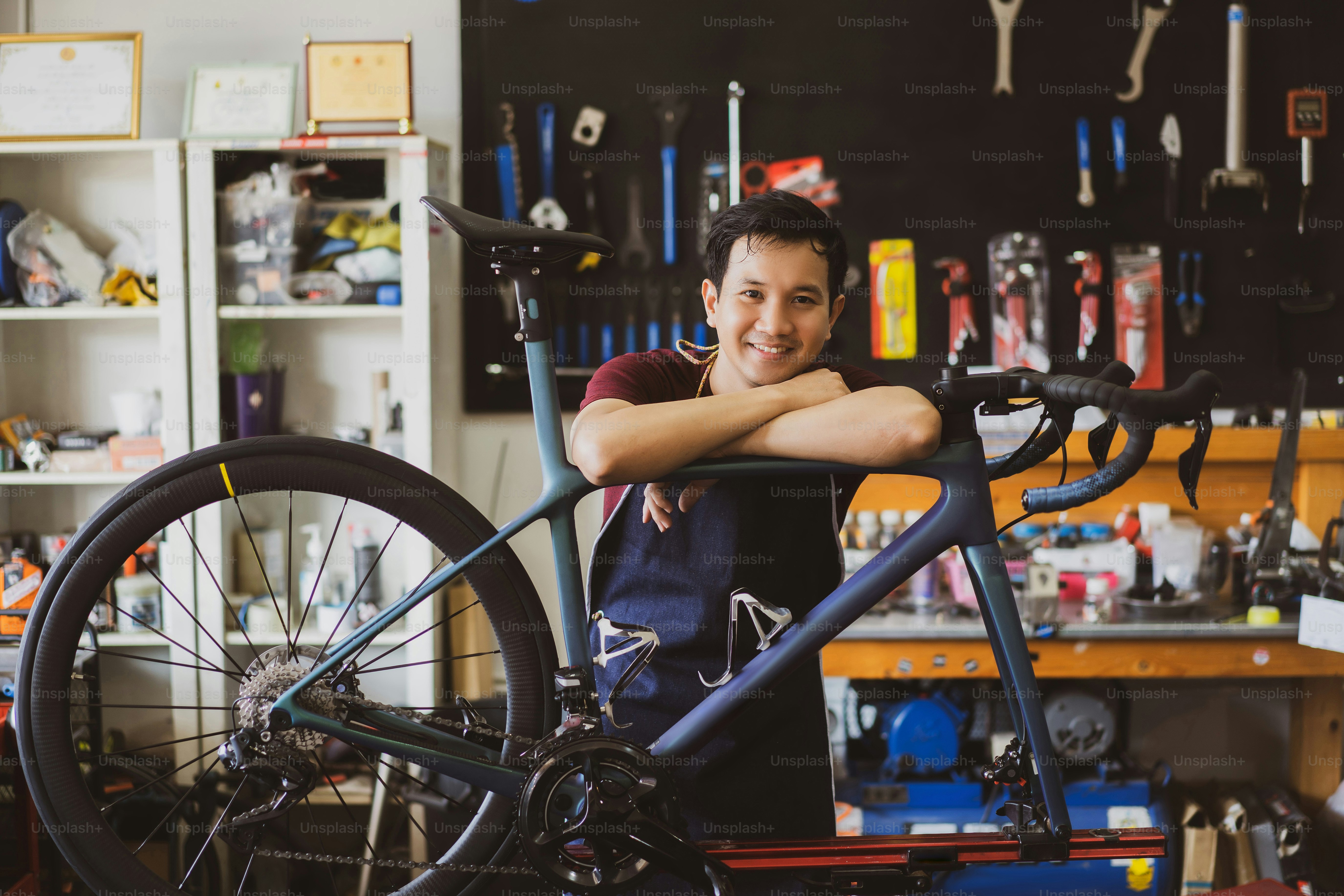 Repair technician  bicycles was repaired gear bike shop.