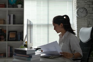 Asian business woman working in office