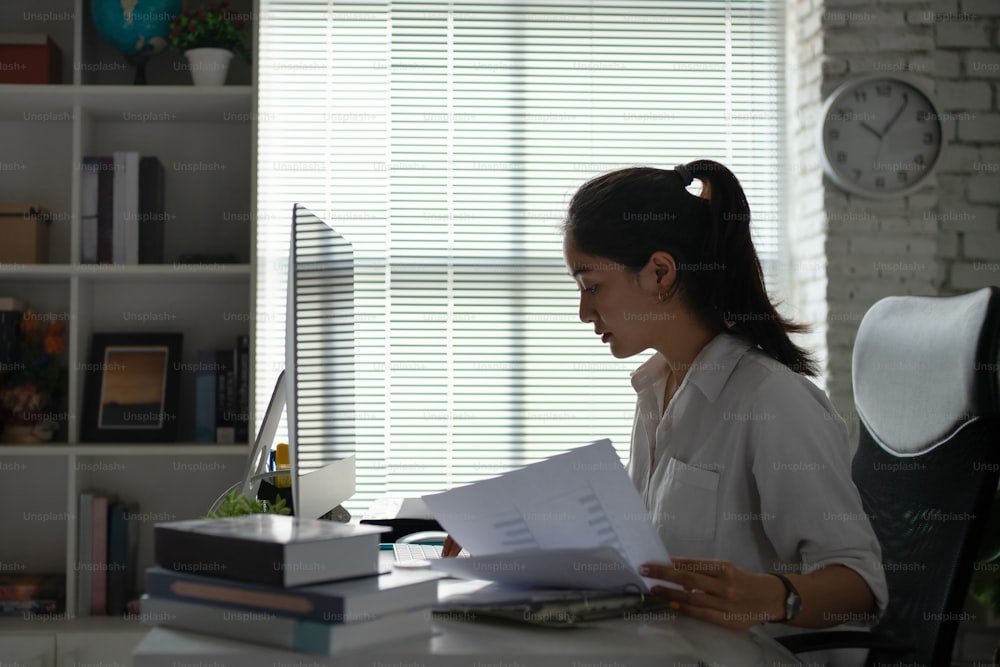 Asian business woman working in office