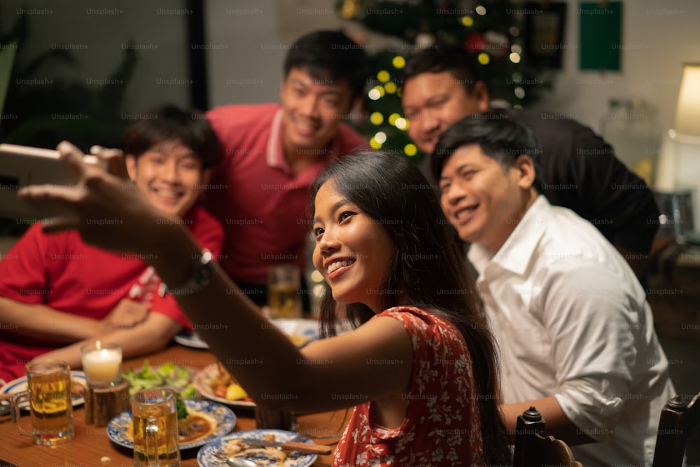 Asian groups have parties, dine and beer. In the evening, at home, they take a selfie.