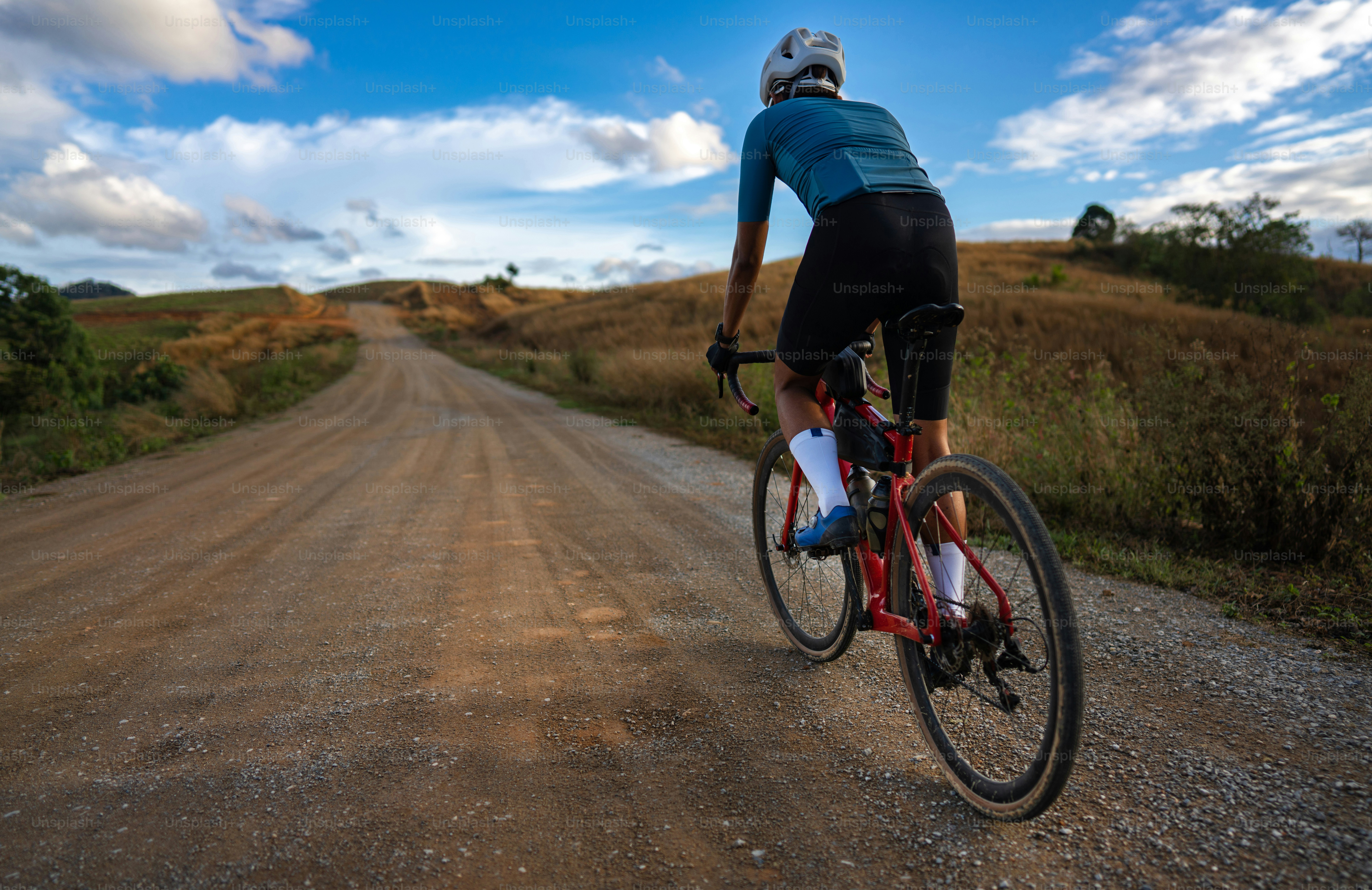 Cyclists practicing on gravel roads