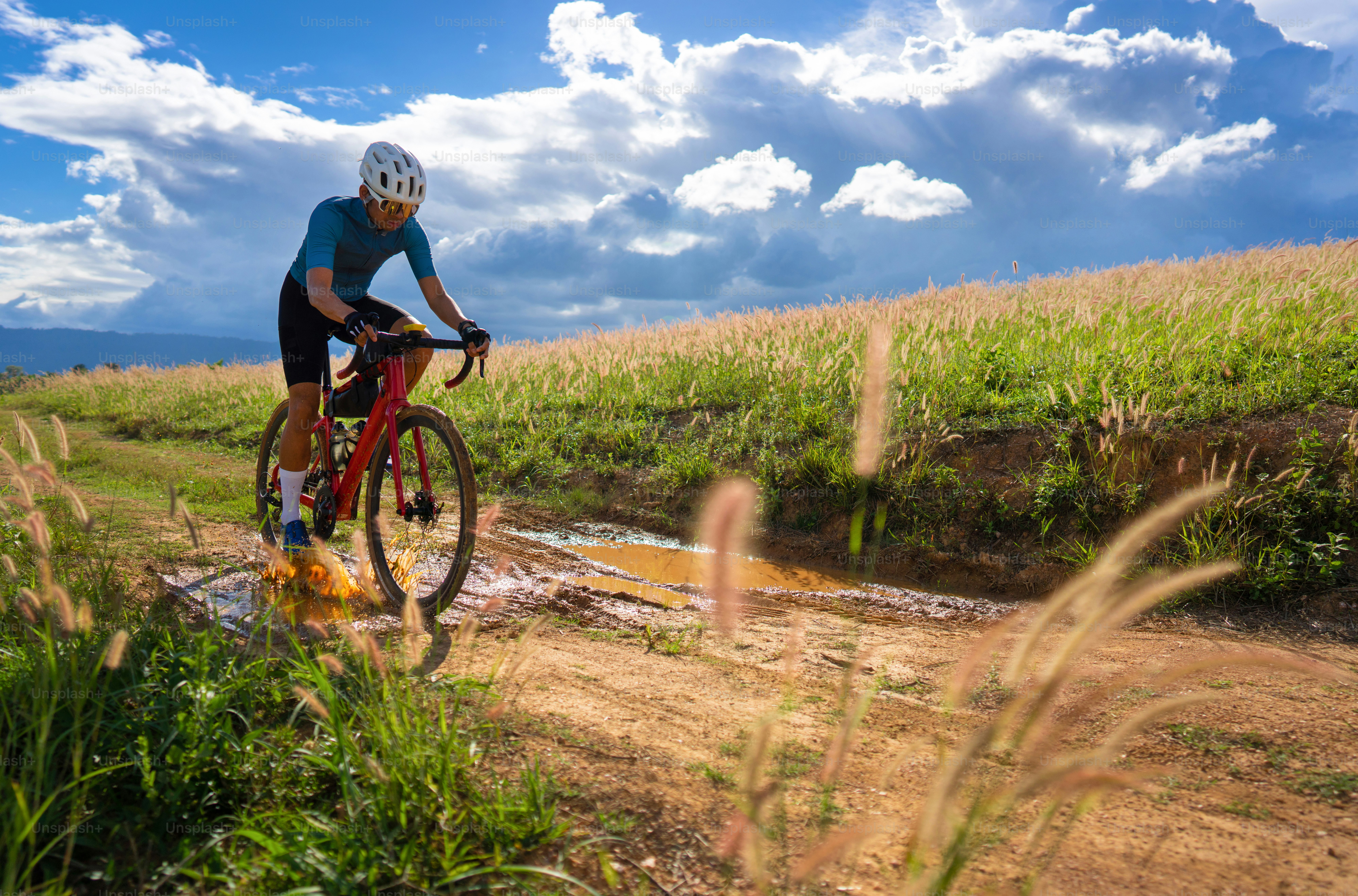 Cyclists practicing on gravel roads