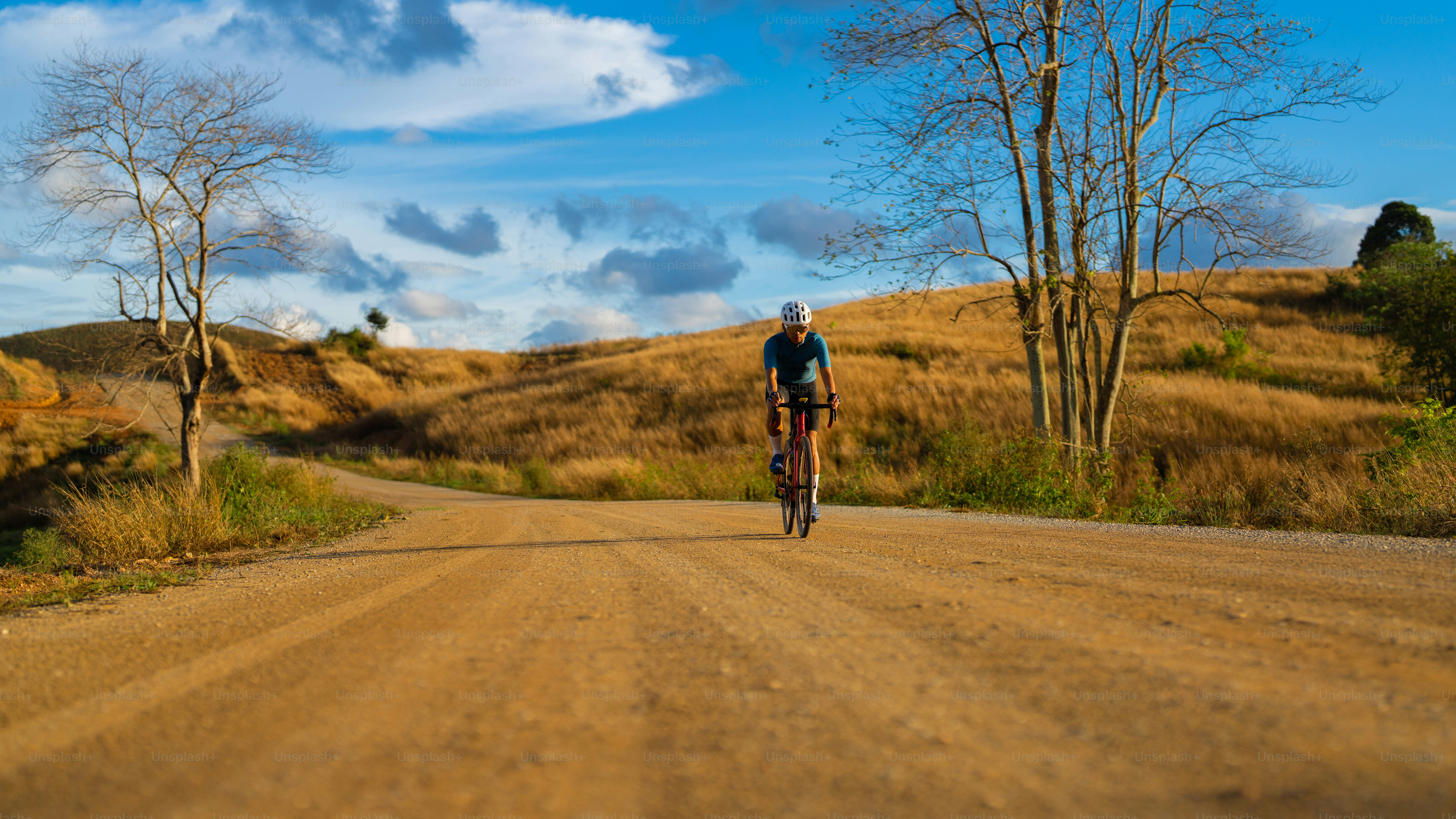 Cyclists practicing on gravel roads