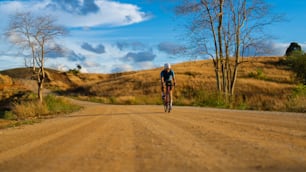 Cyclists practicing on gravel roads
