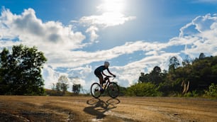 Cyclists practicing on gravel roads