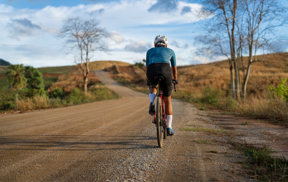 Cyclists practicing on gravel roads