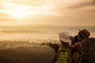 Woman tourist are photographing landscapes they visit