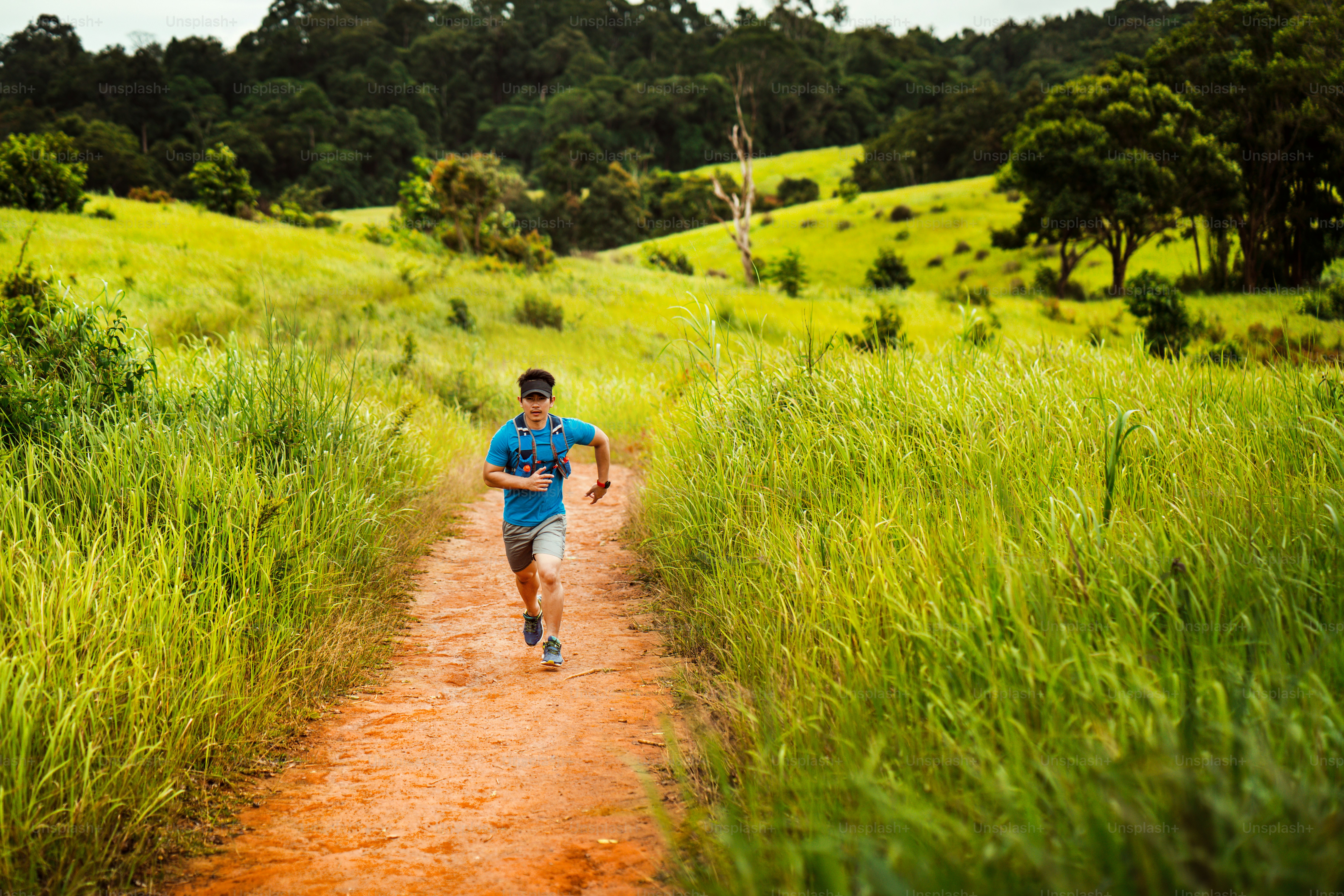 Male Runner of Trail. He was running fast on the mountain