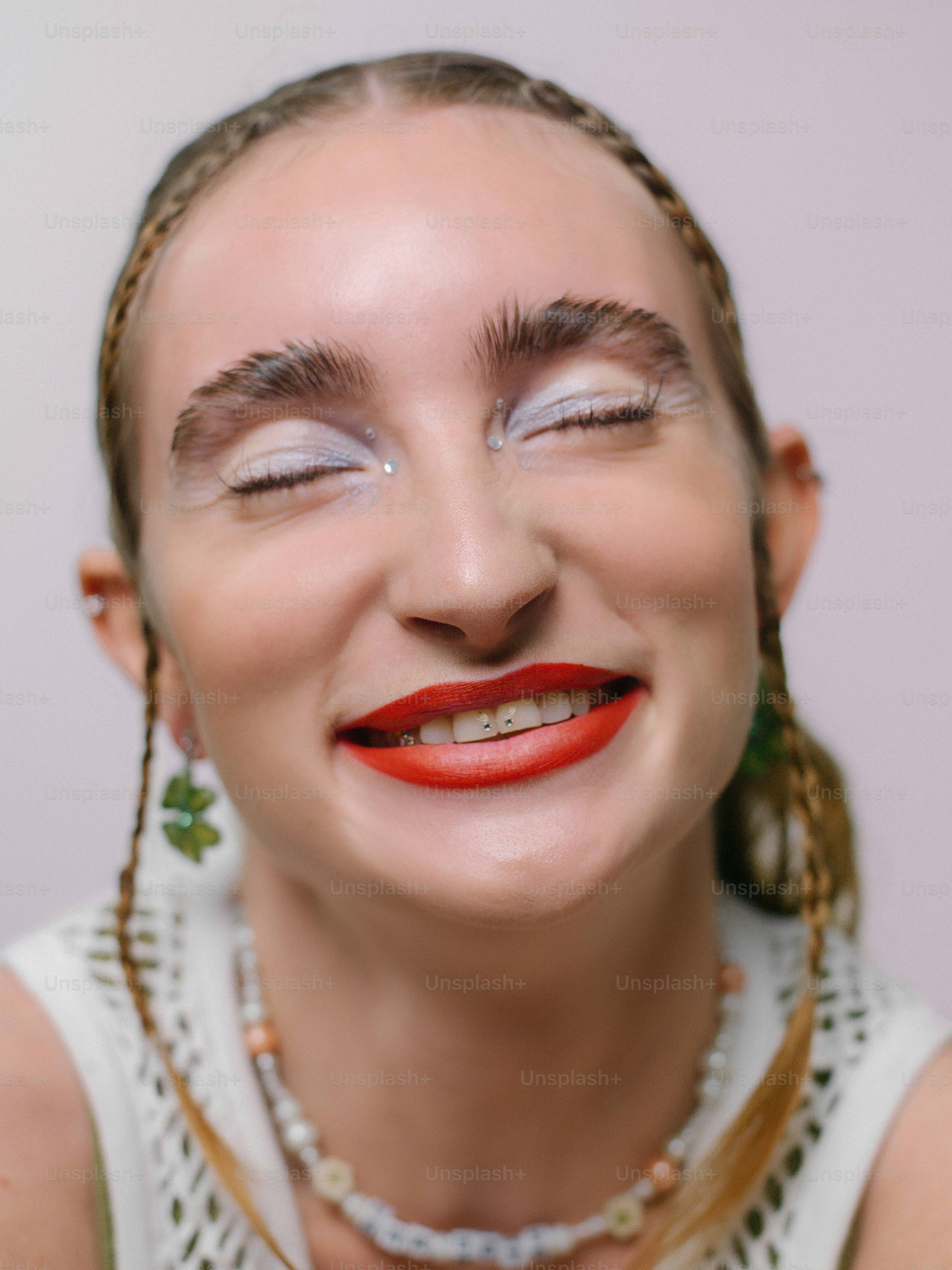 a woman with a large smile