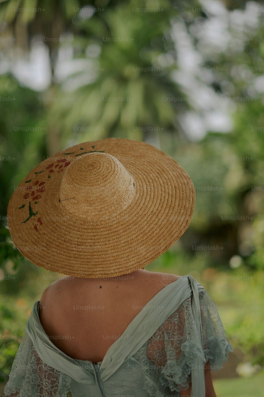 a person holding a coconut