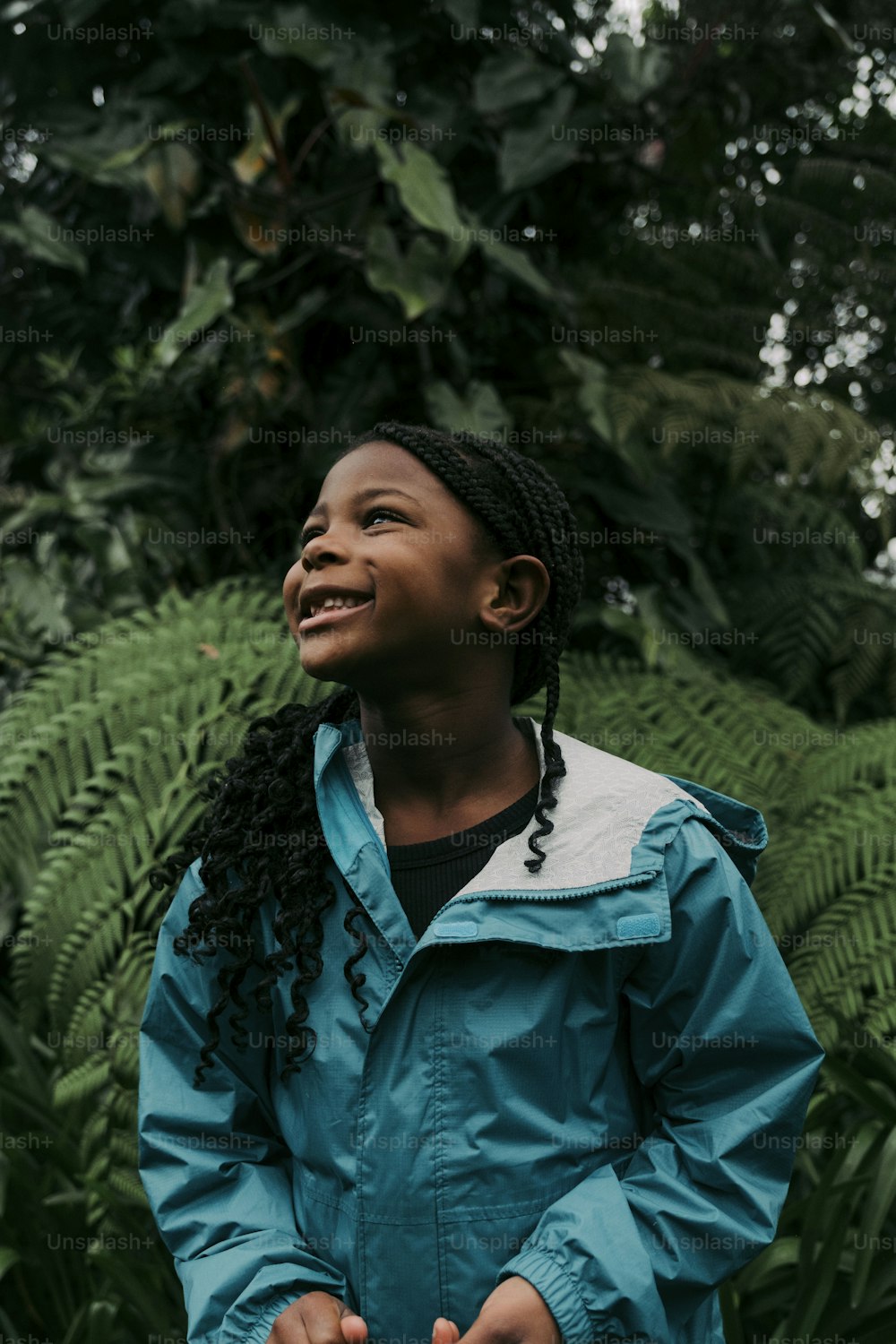 a person standing in front of a tree