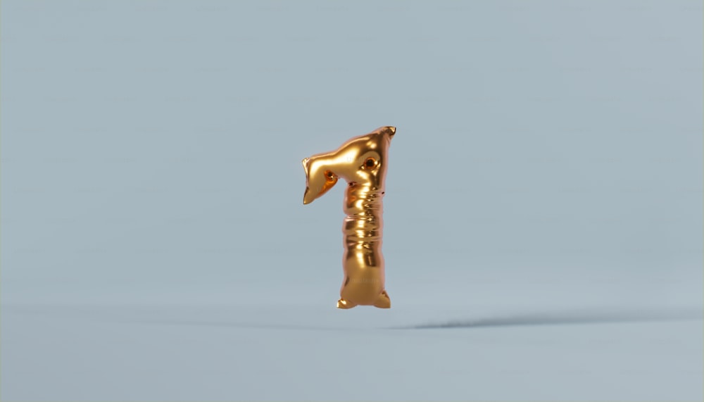 a small gold animal