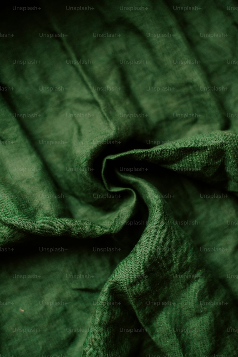 a close up of a green cloth