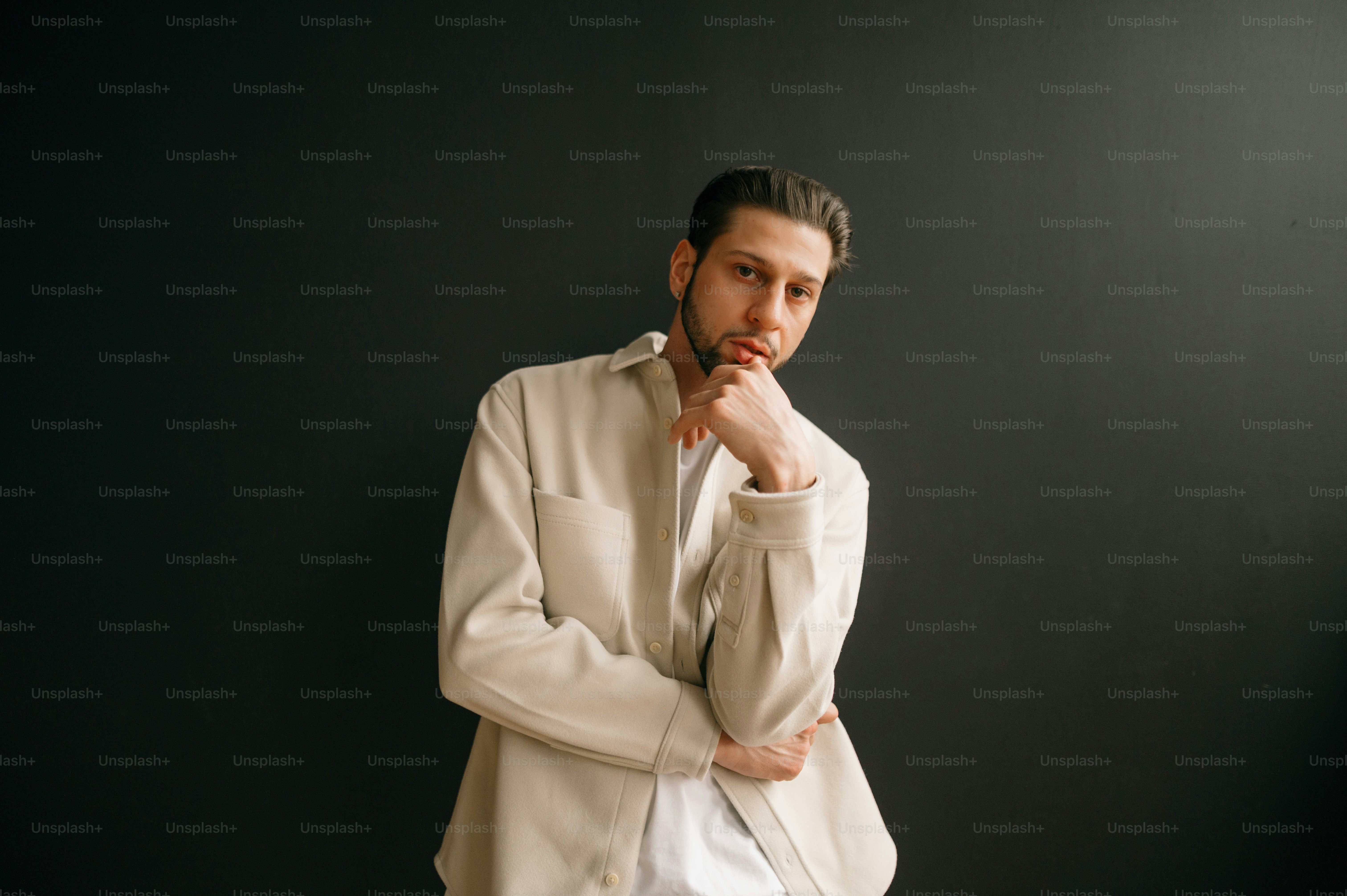 A person in a white robe photo – Male pose Image on Unsplash
