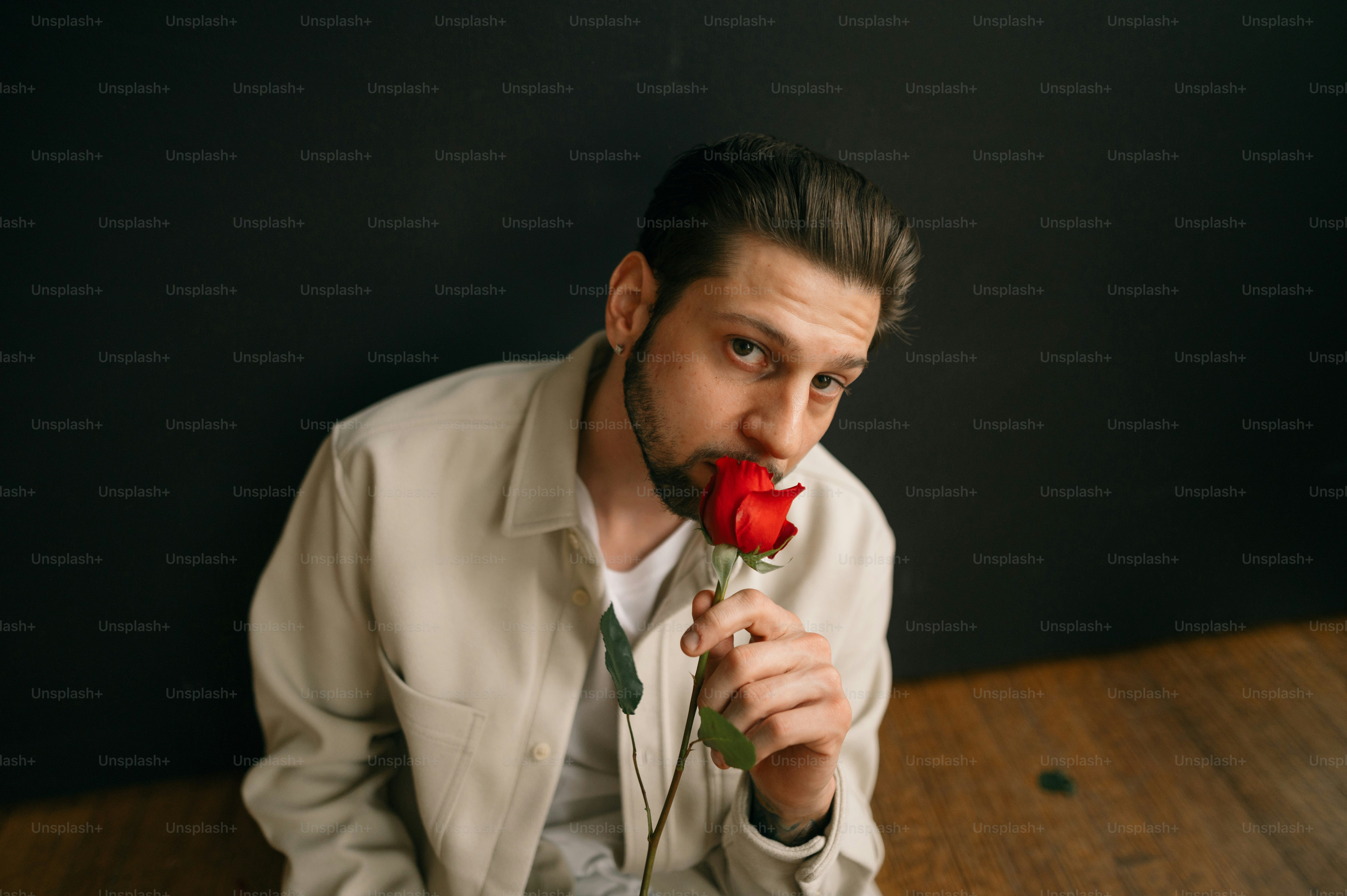 a person holding a rose