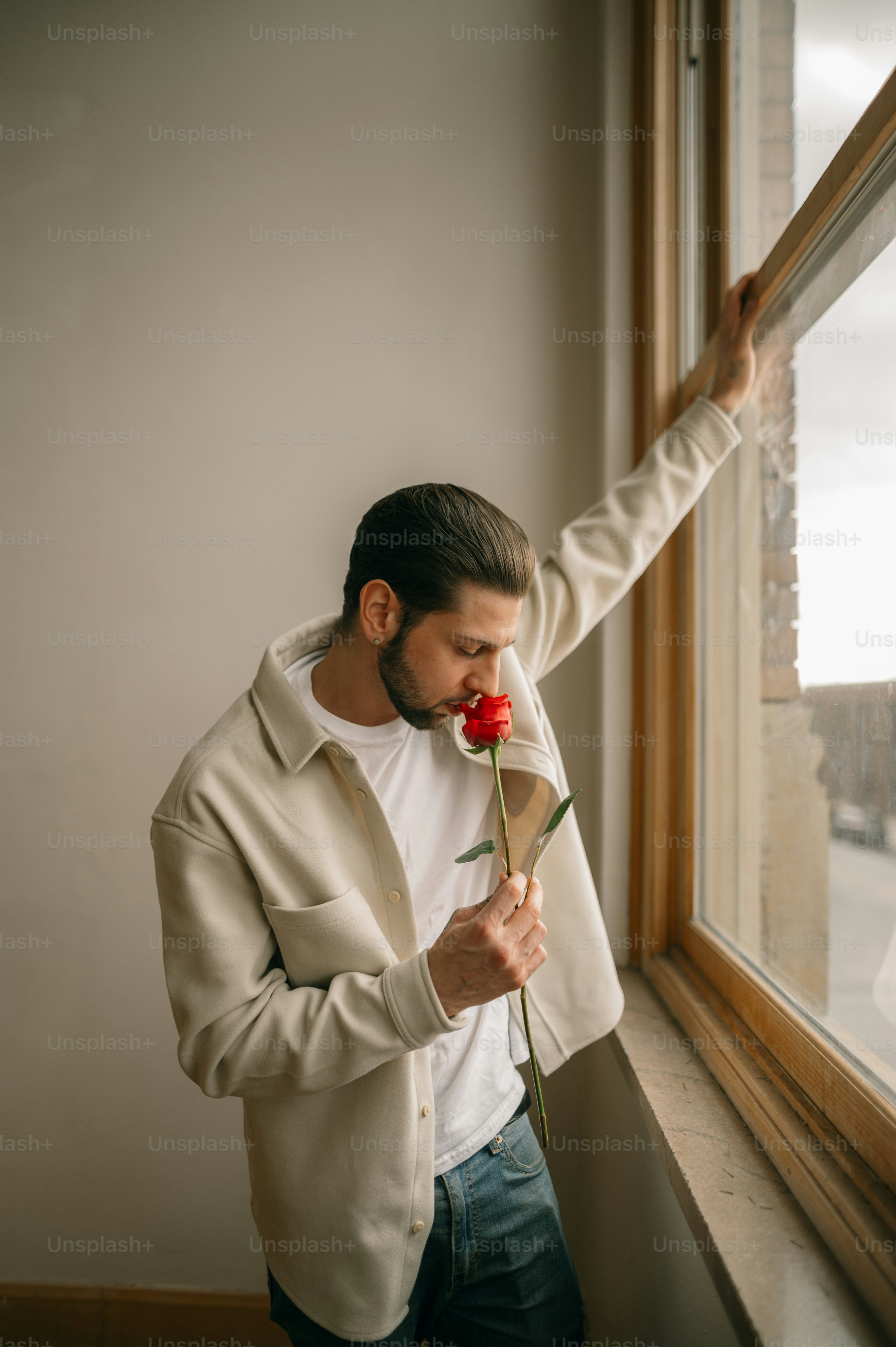 a person holding a rose