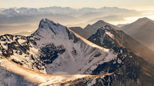 a mountain range covered in snow