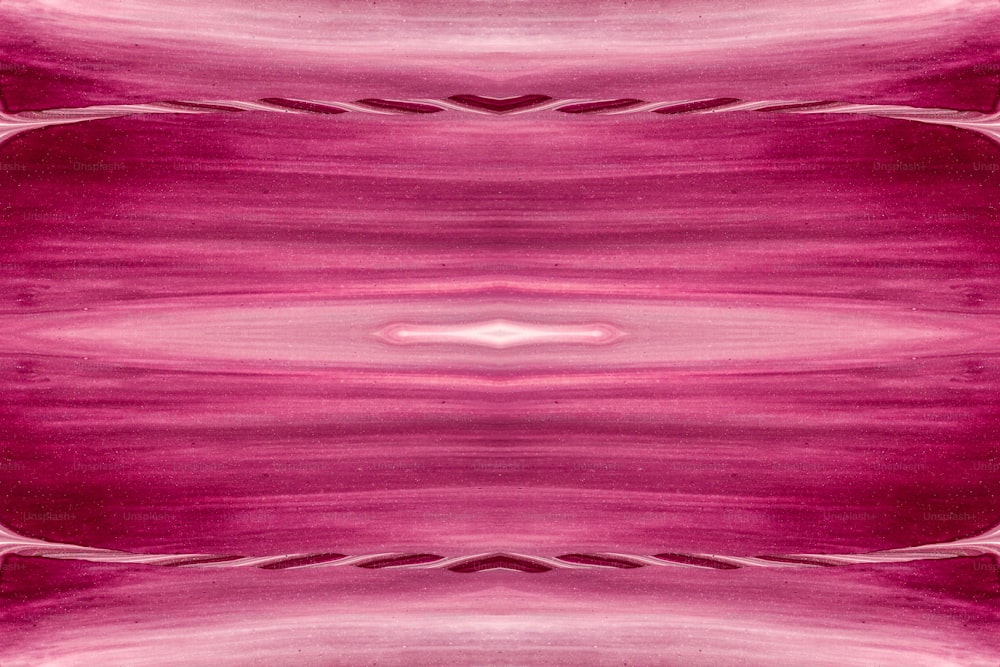 a pink surface with a white line