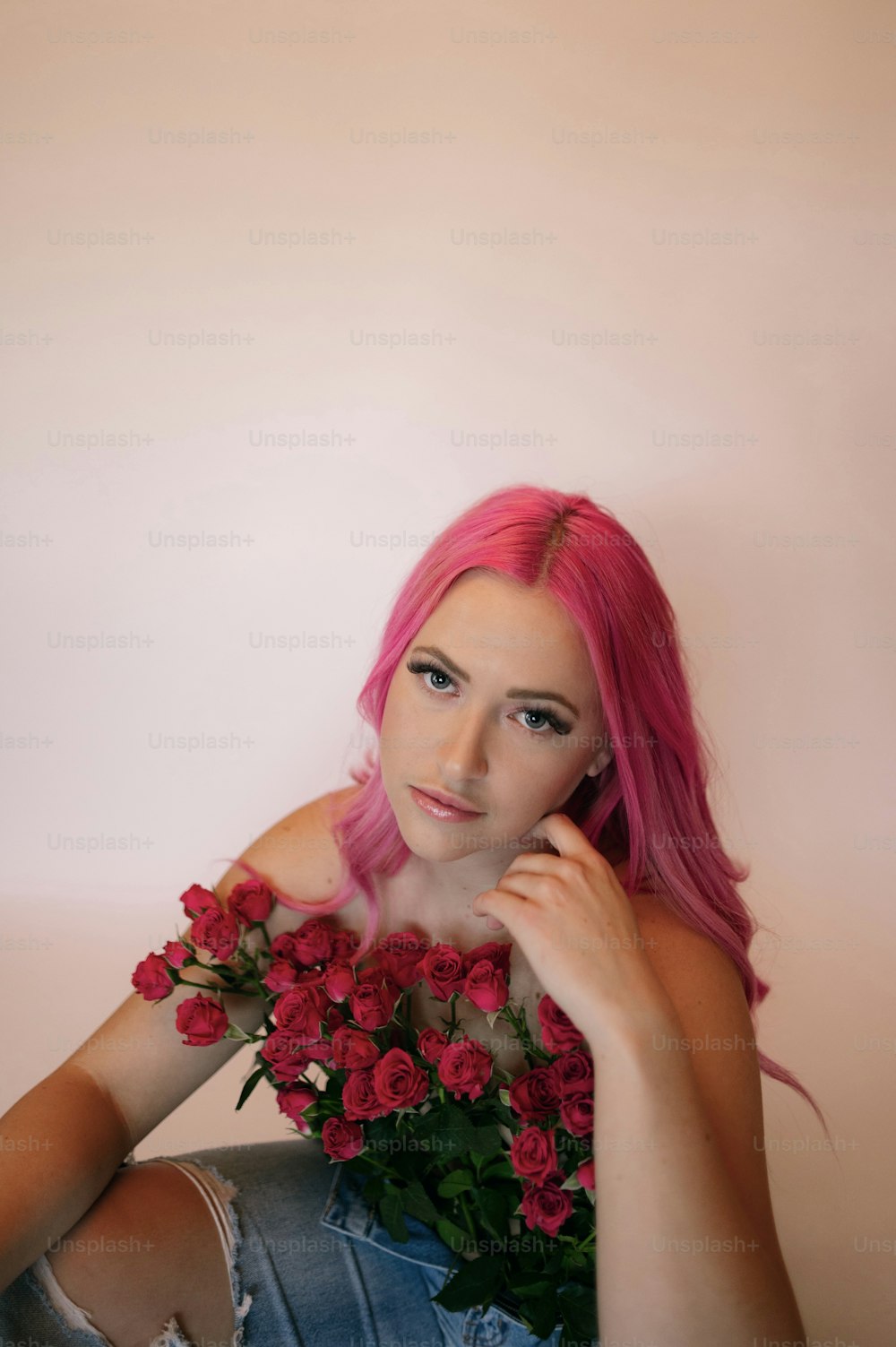 a woman with pink hair