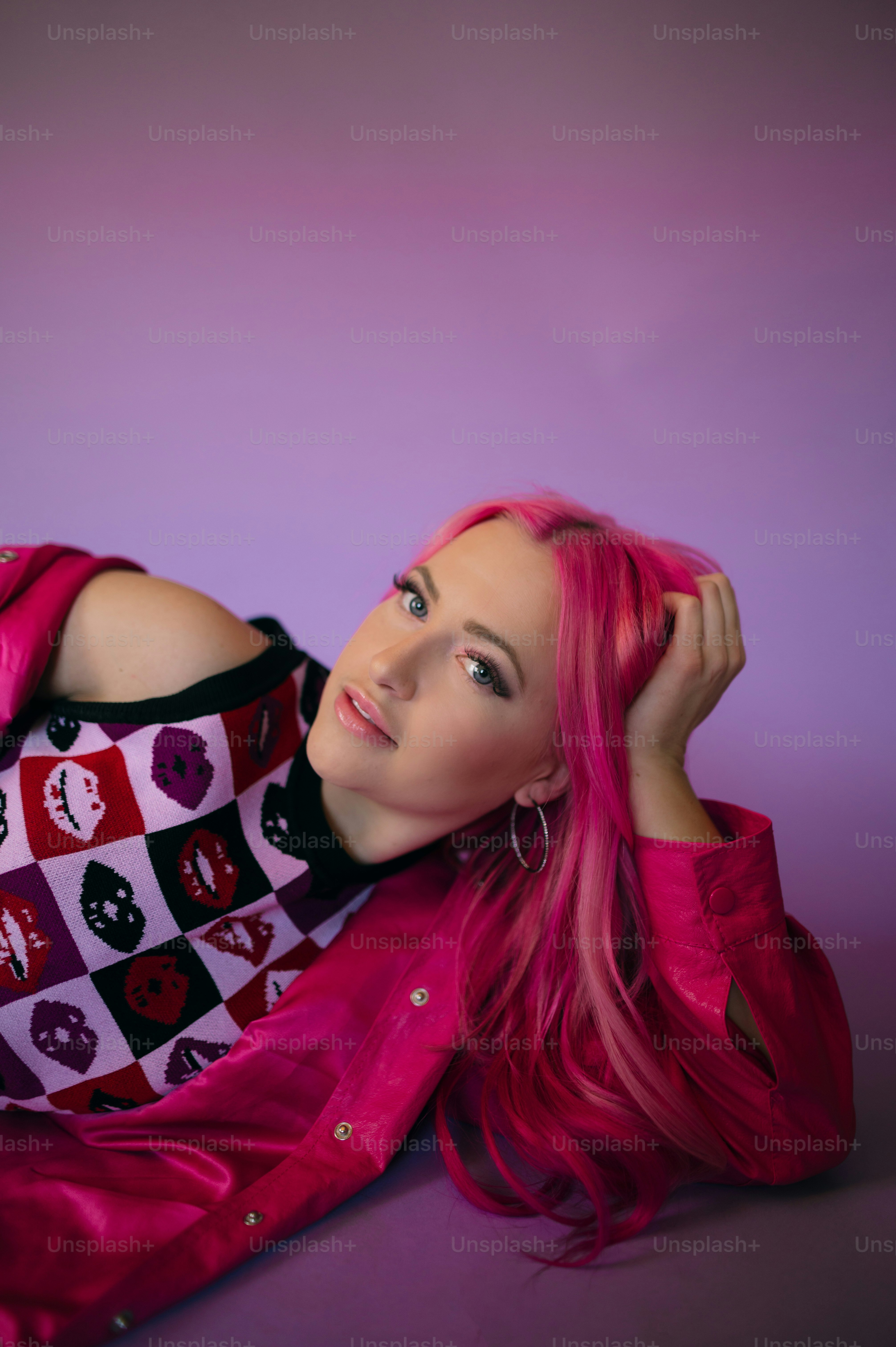 a woman with pink hair