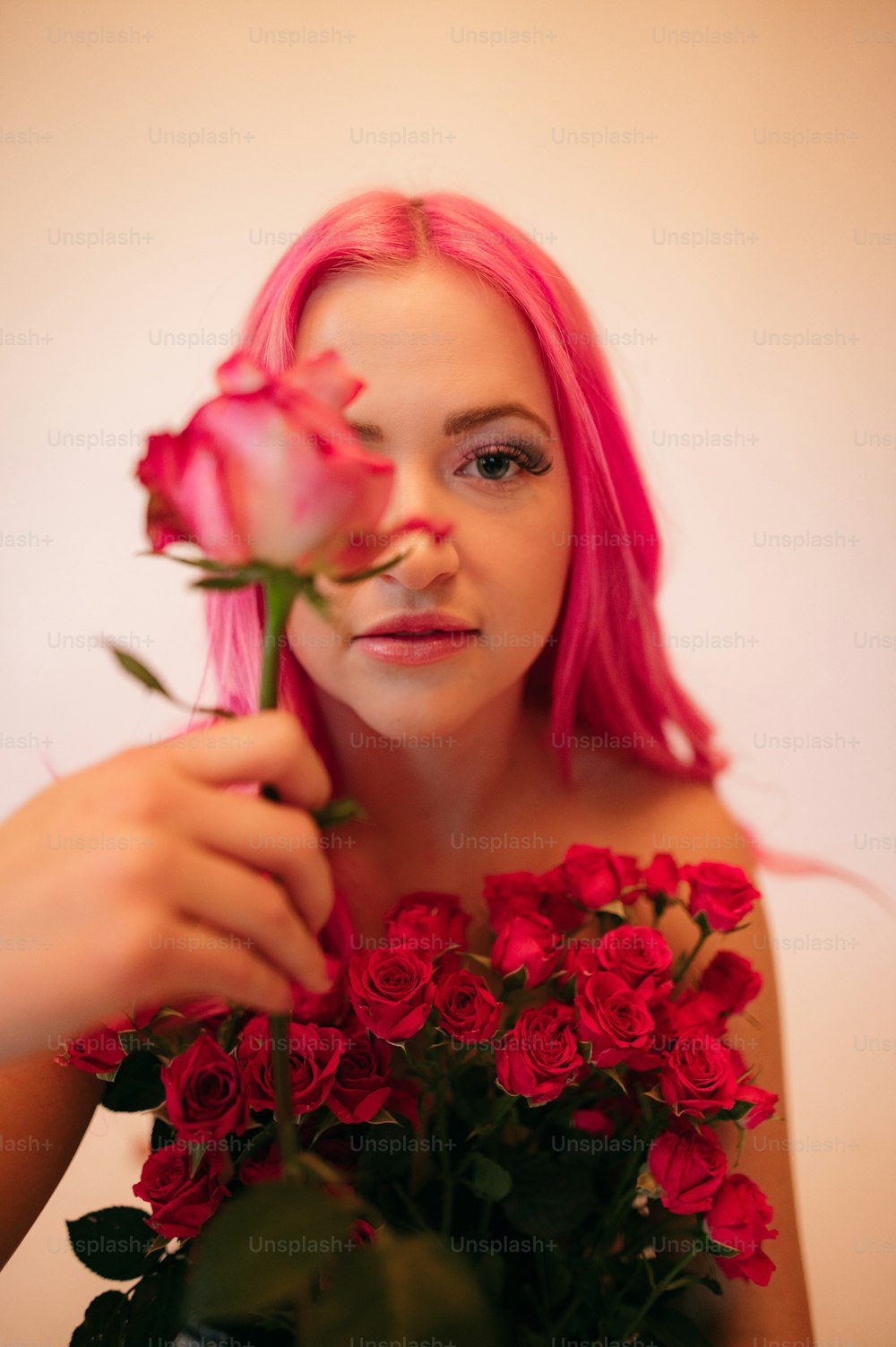 a person holding a rose