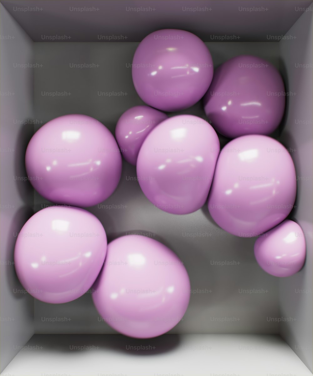 a group of pink balloons