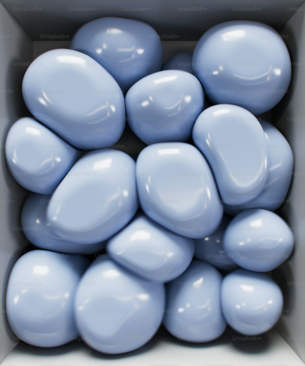 a group of blue and white balloons