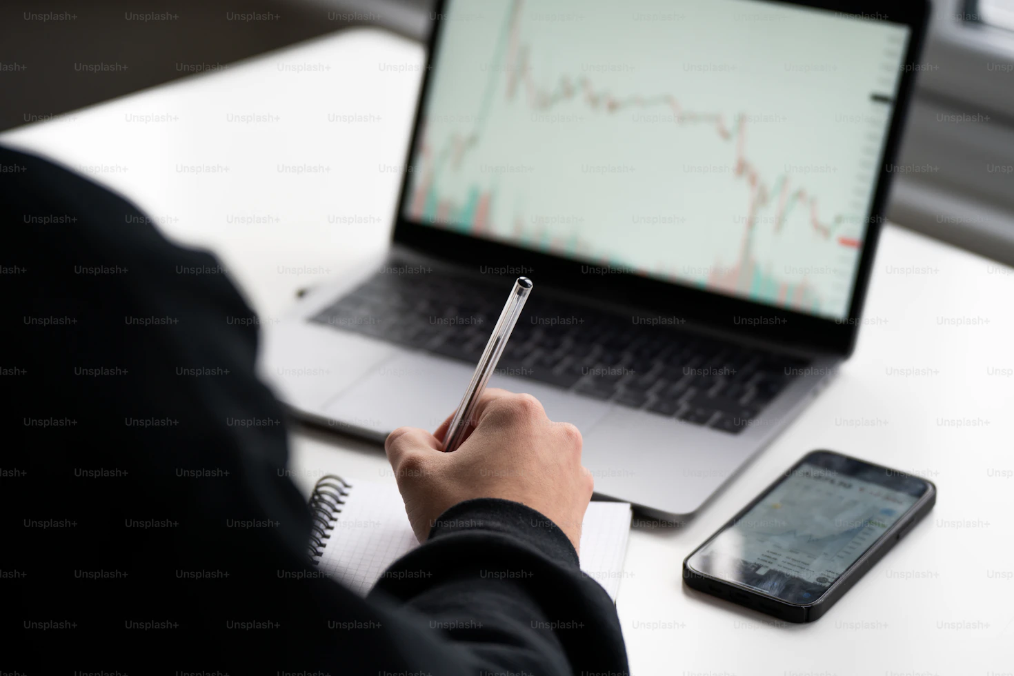 Cryptocurrency market charts displaying green and red candlesticks