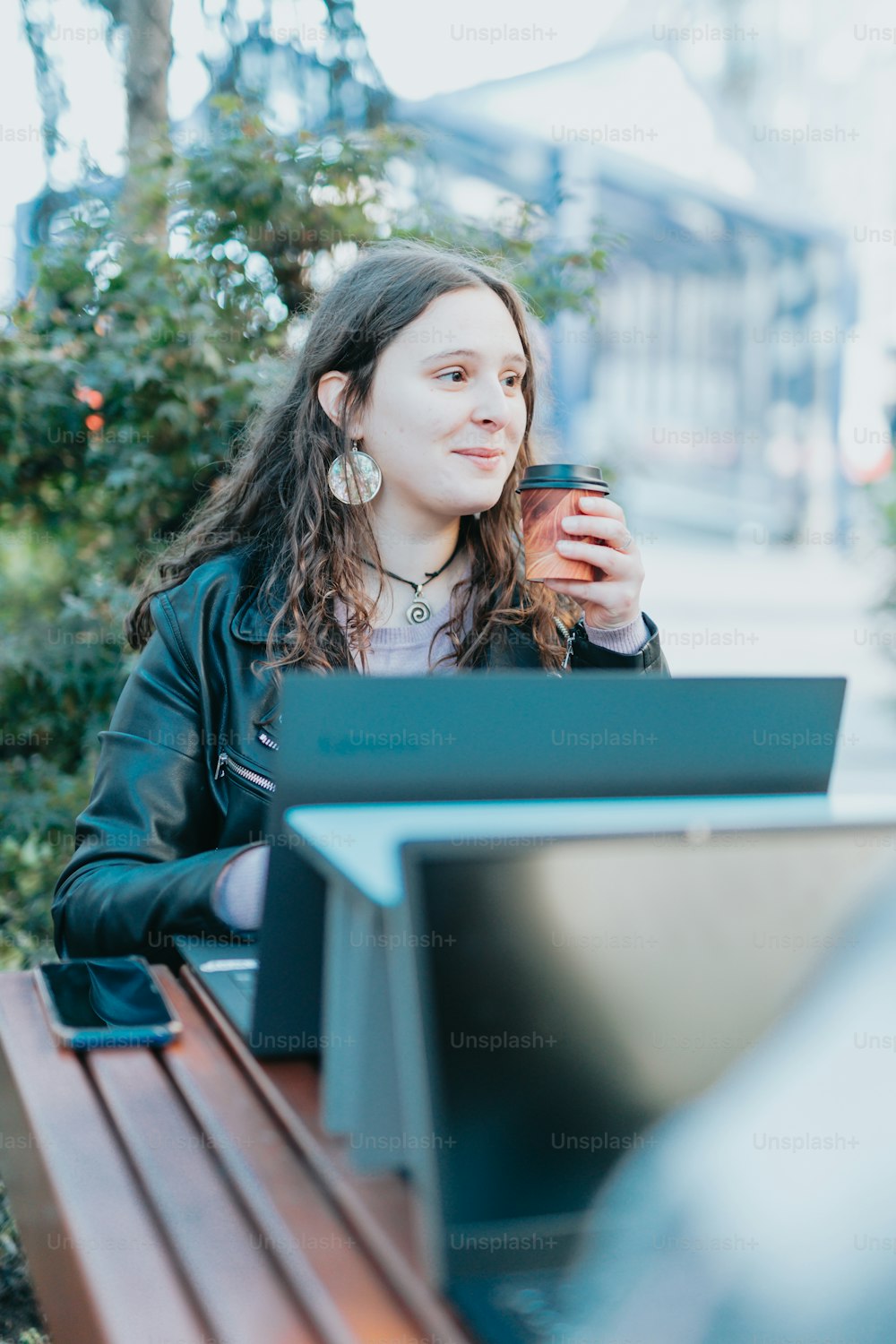 a woman holding a glass of wine