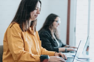 women looking at a laptop