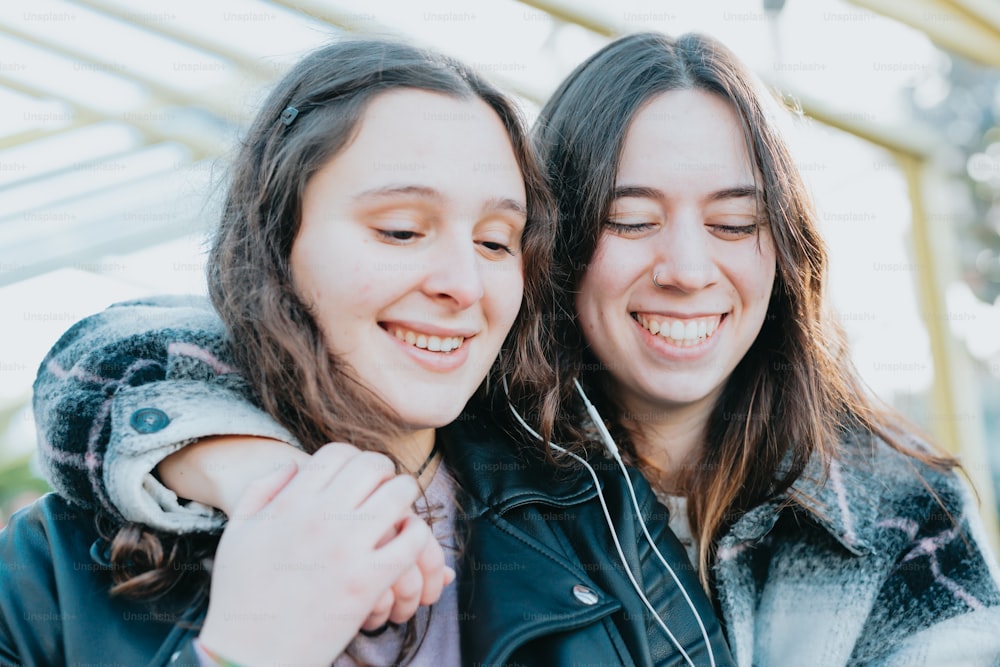 a couple of women smiling