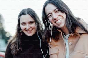 a couple of women smiling