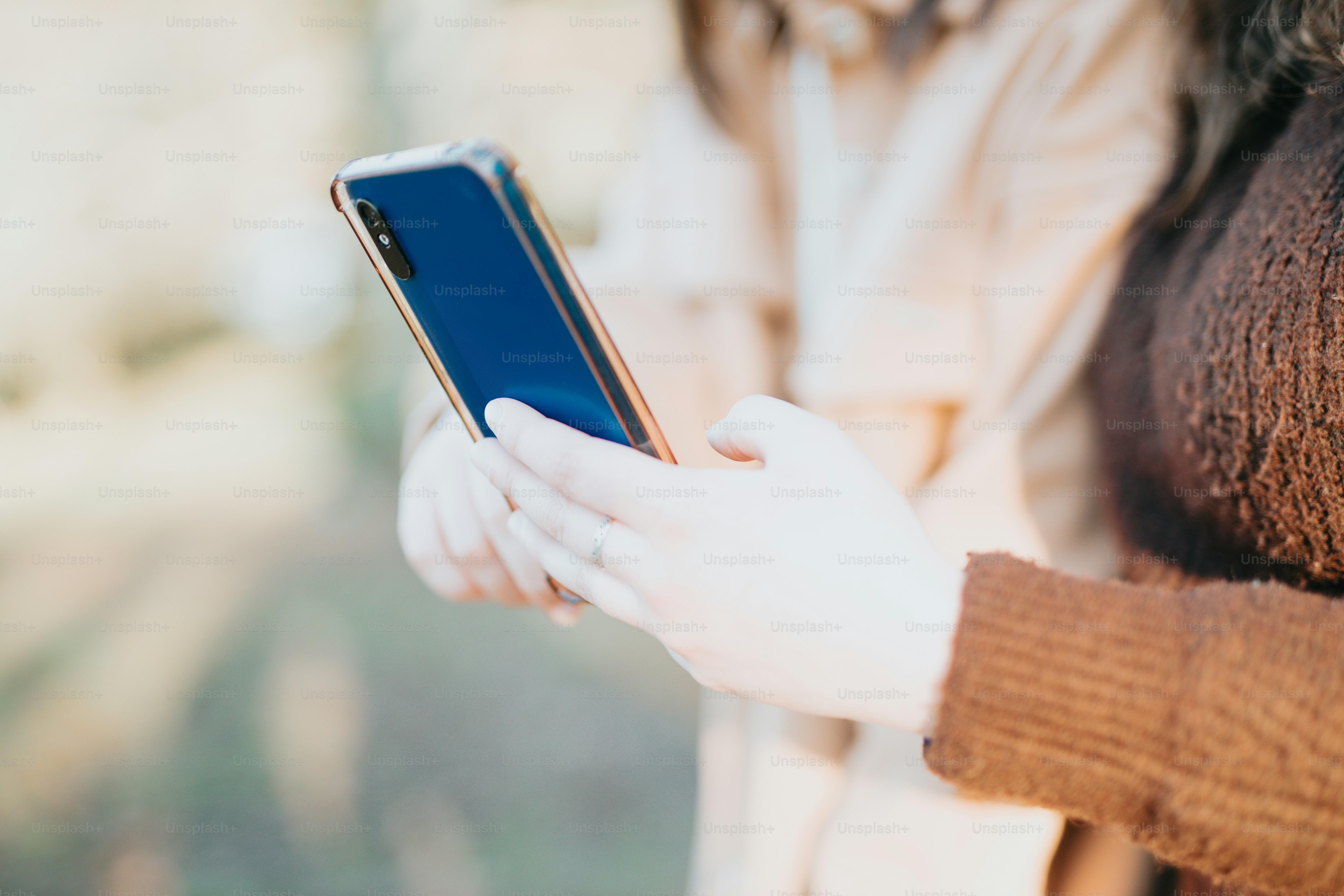 a person using a cell phone