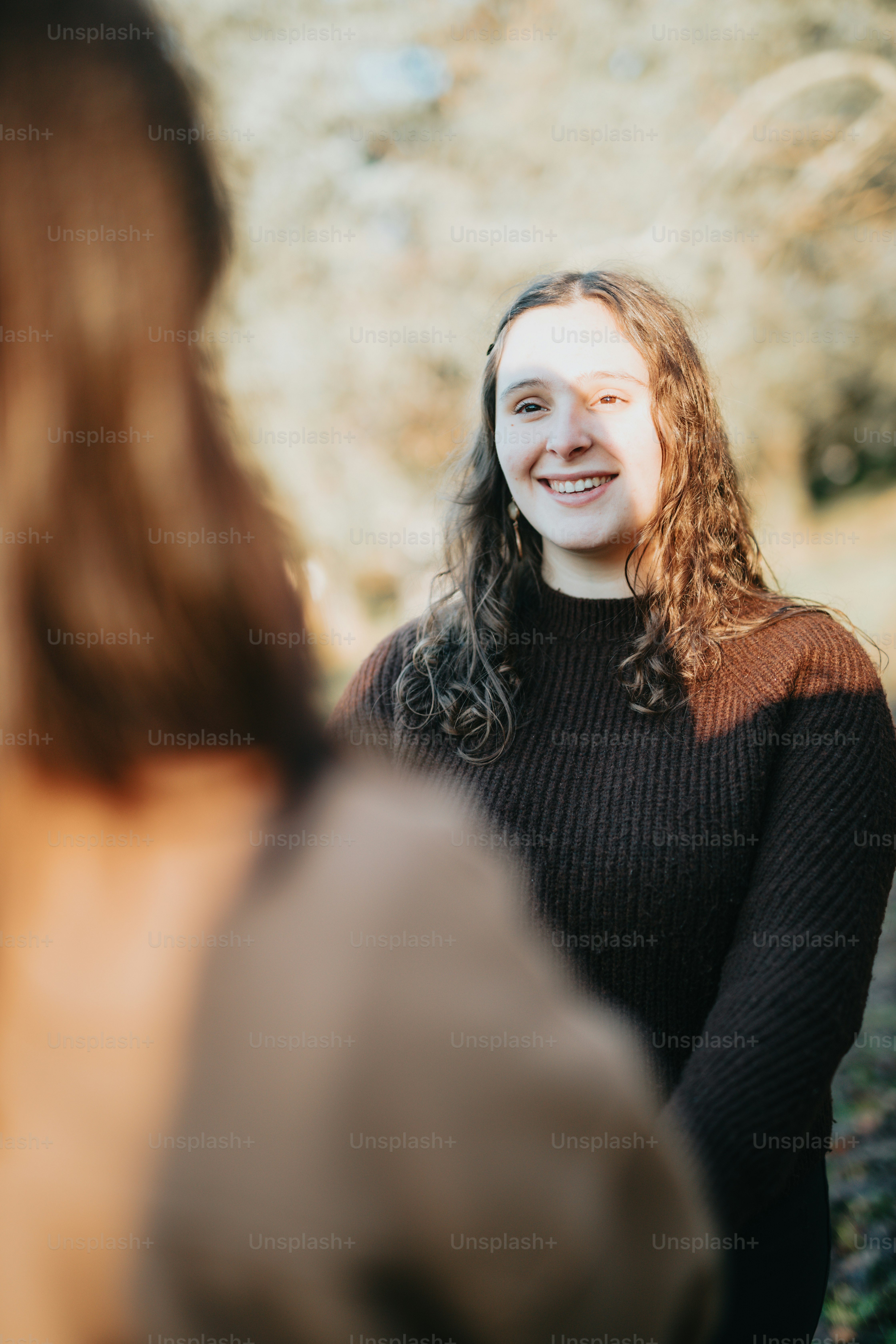 a woman smiling at something