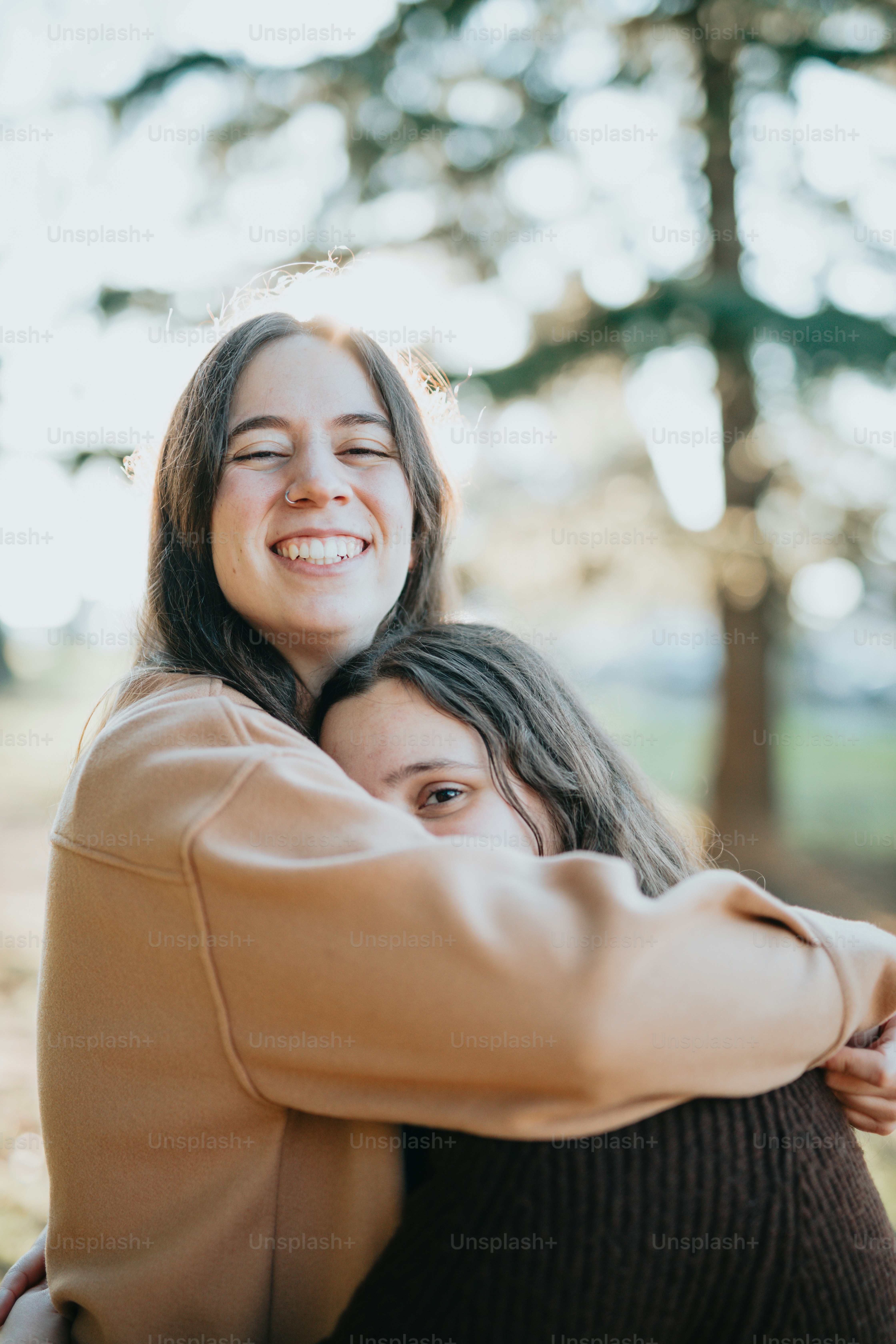 a woman carrying a child