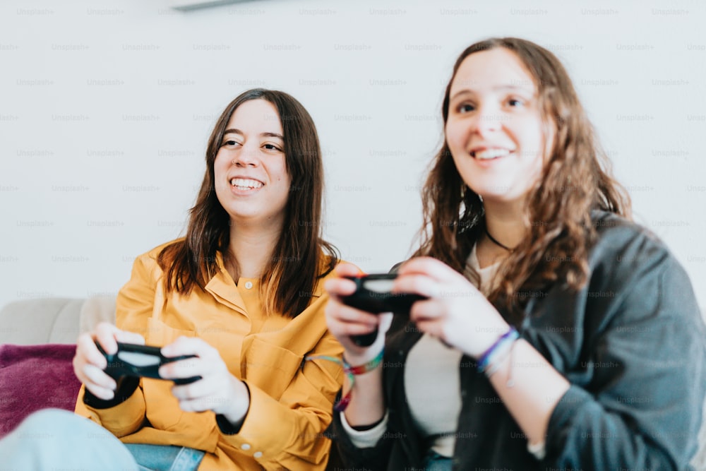 a few women holding game controllers