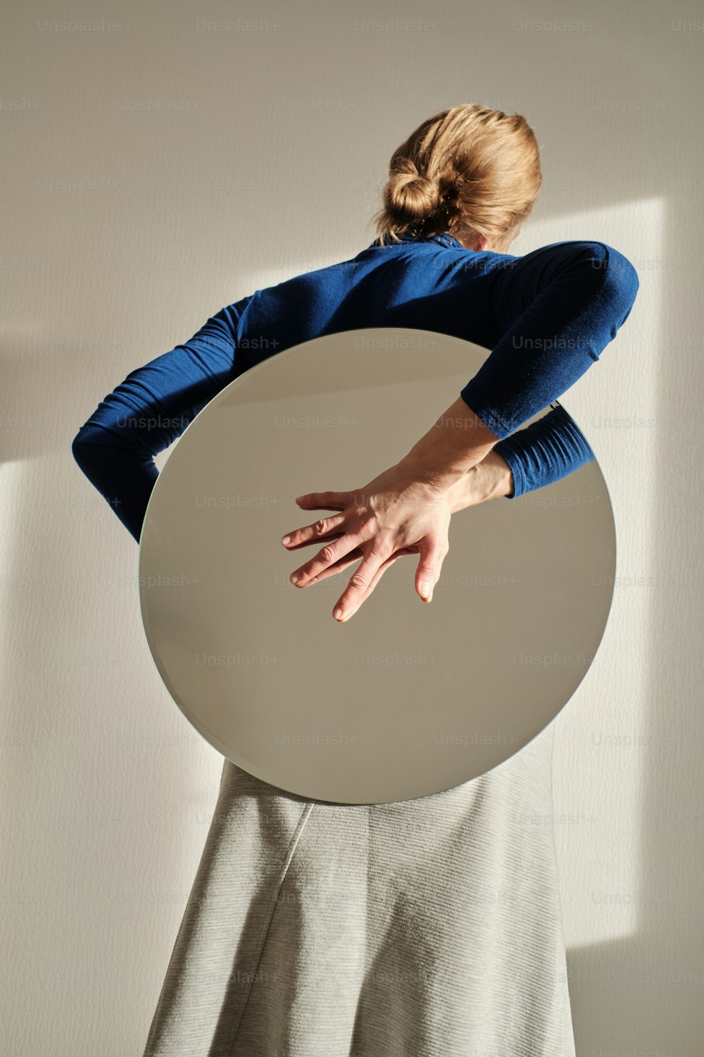 a person holding a large globe