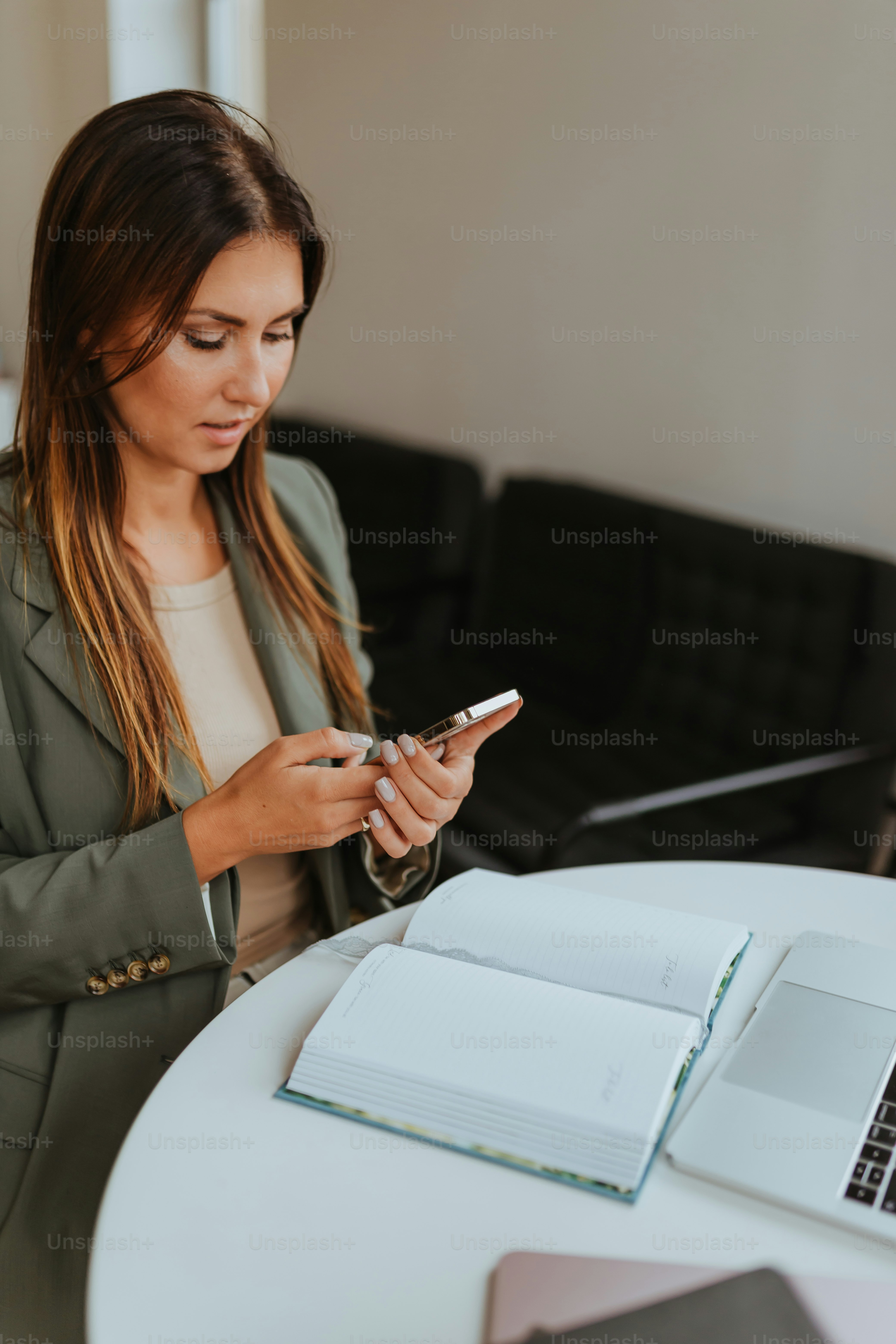 a woman looking at a phone