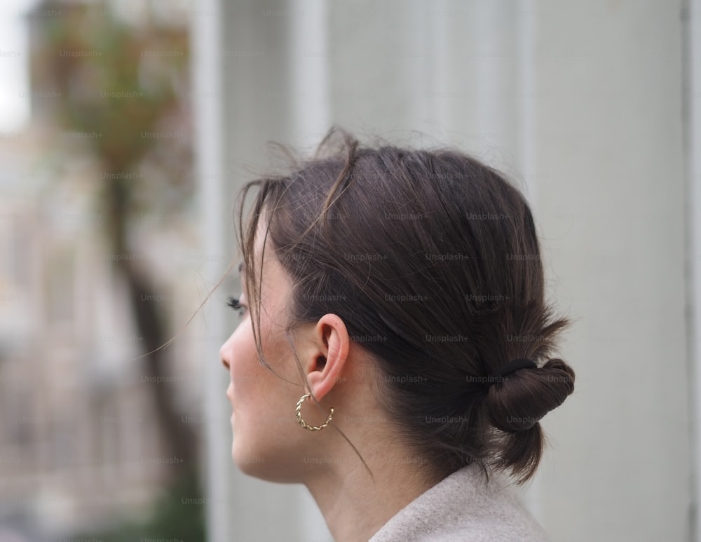 a woman with a ponytail