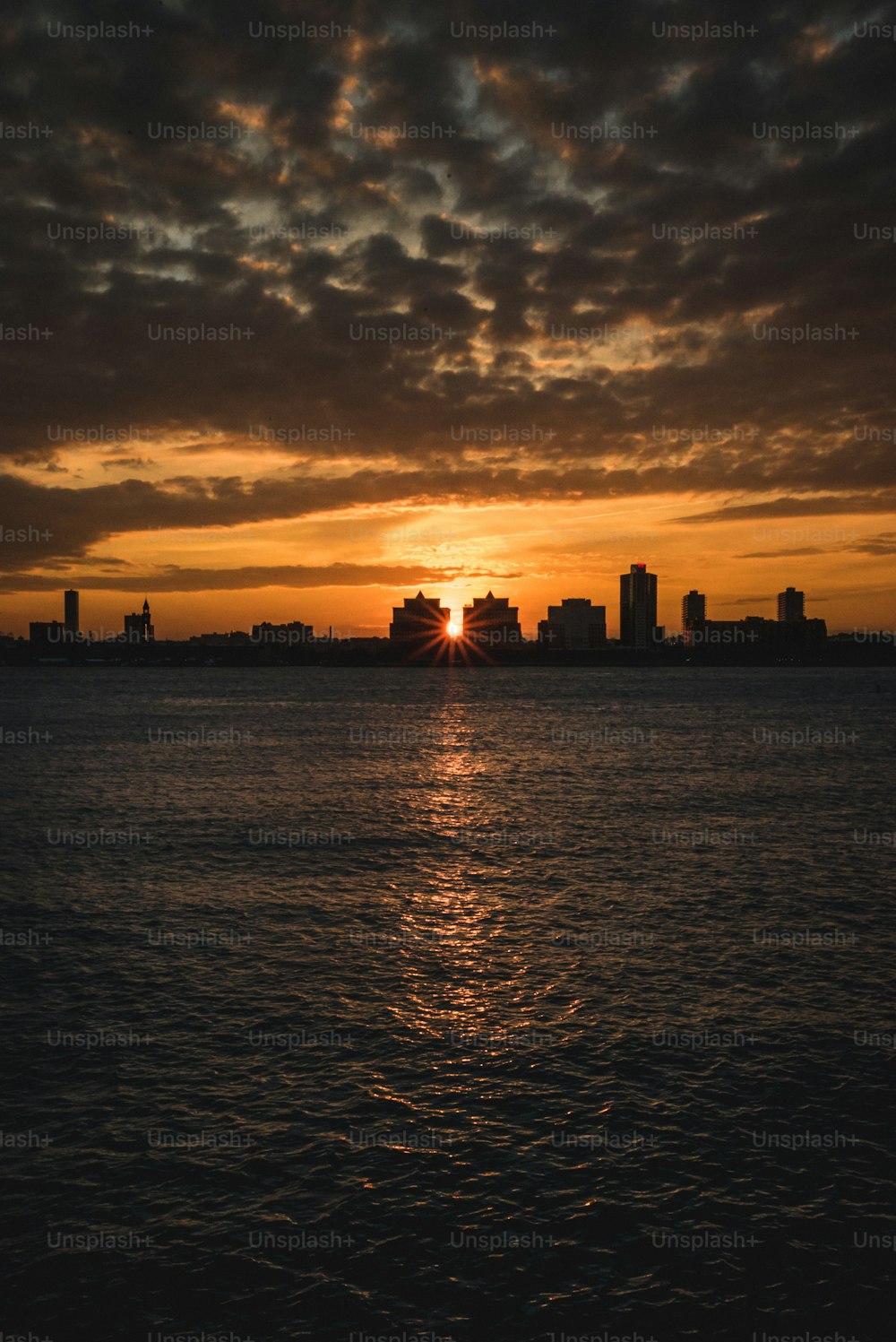 a sunset over a city