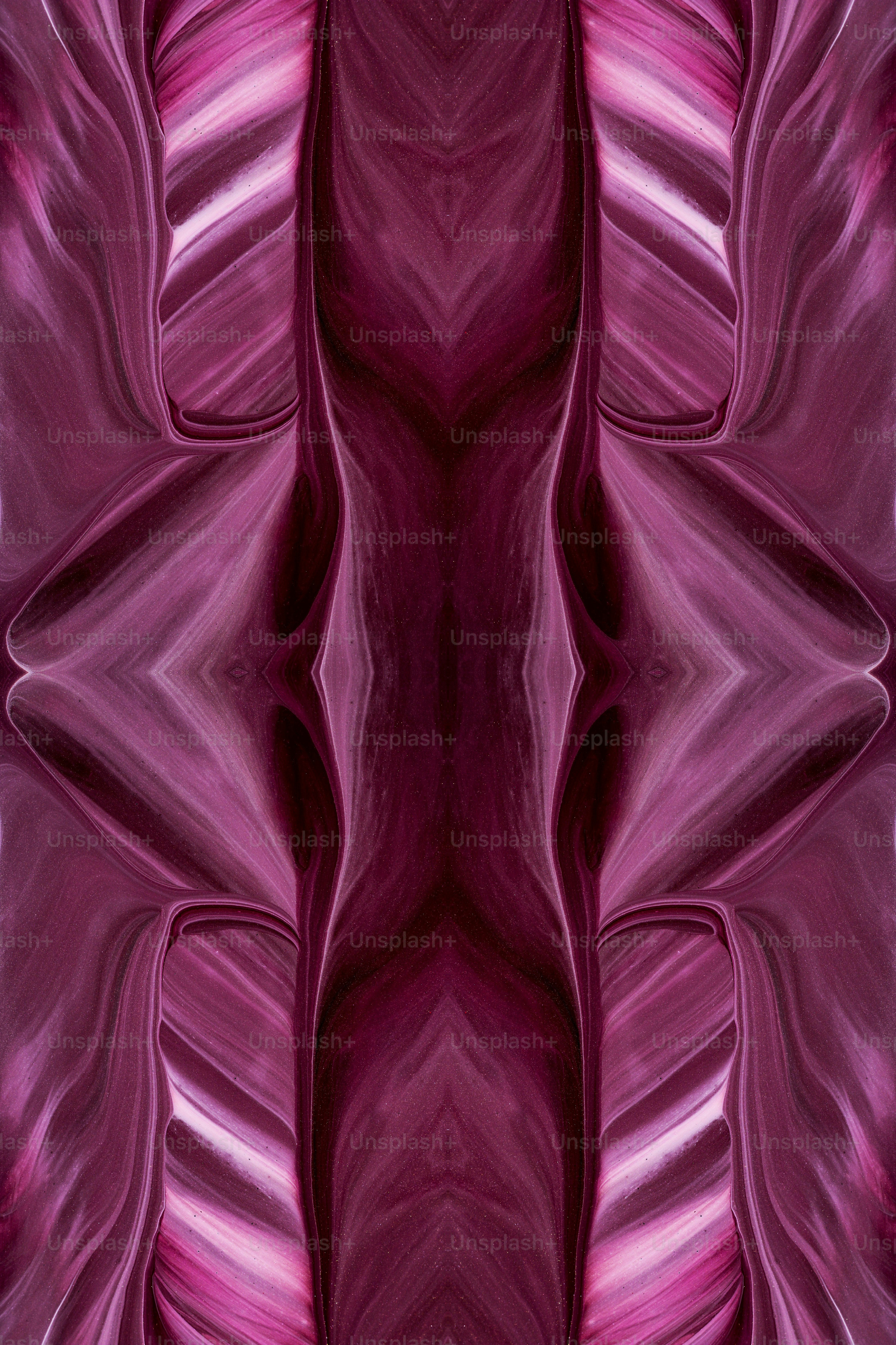 an abstract purple background with a wavy design