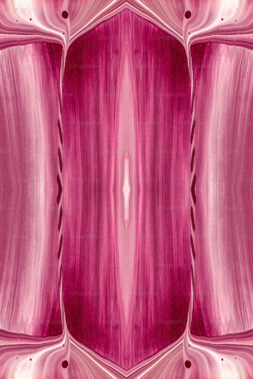 a pink curtain with a hole in it