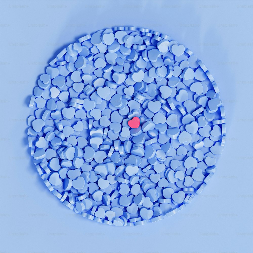 Una esfera azul con muchas bolas pequeñas