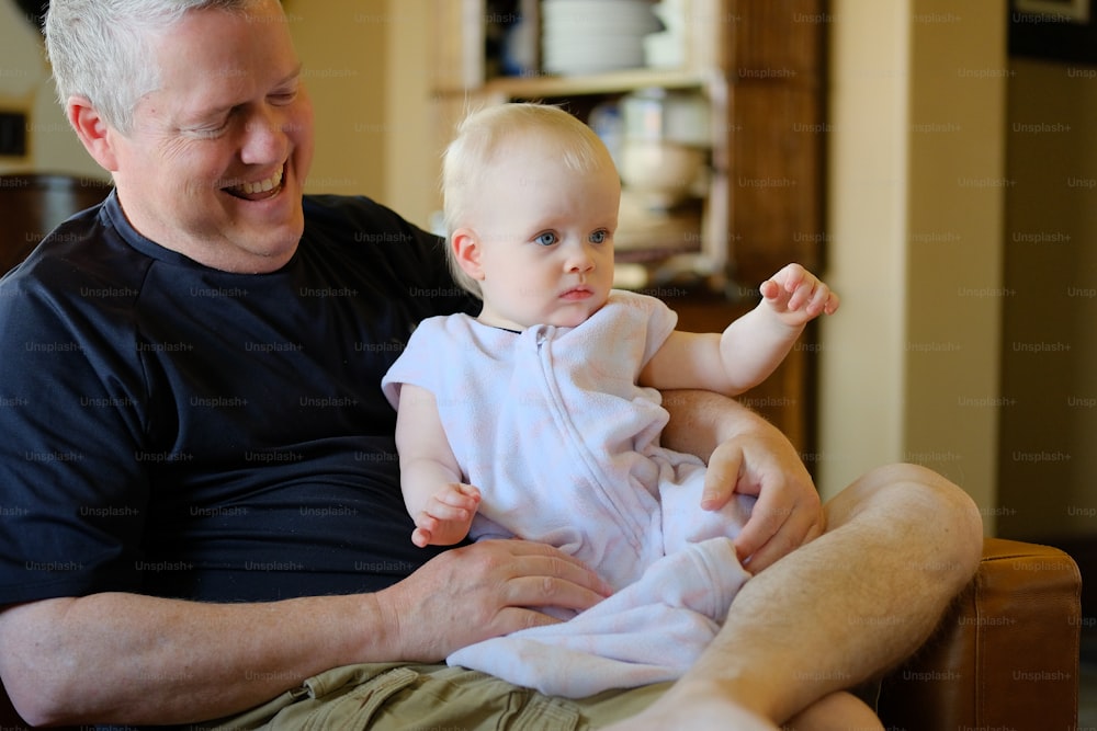 a person holding a baby