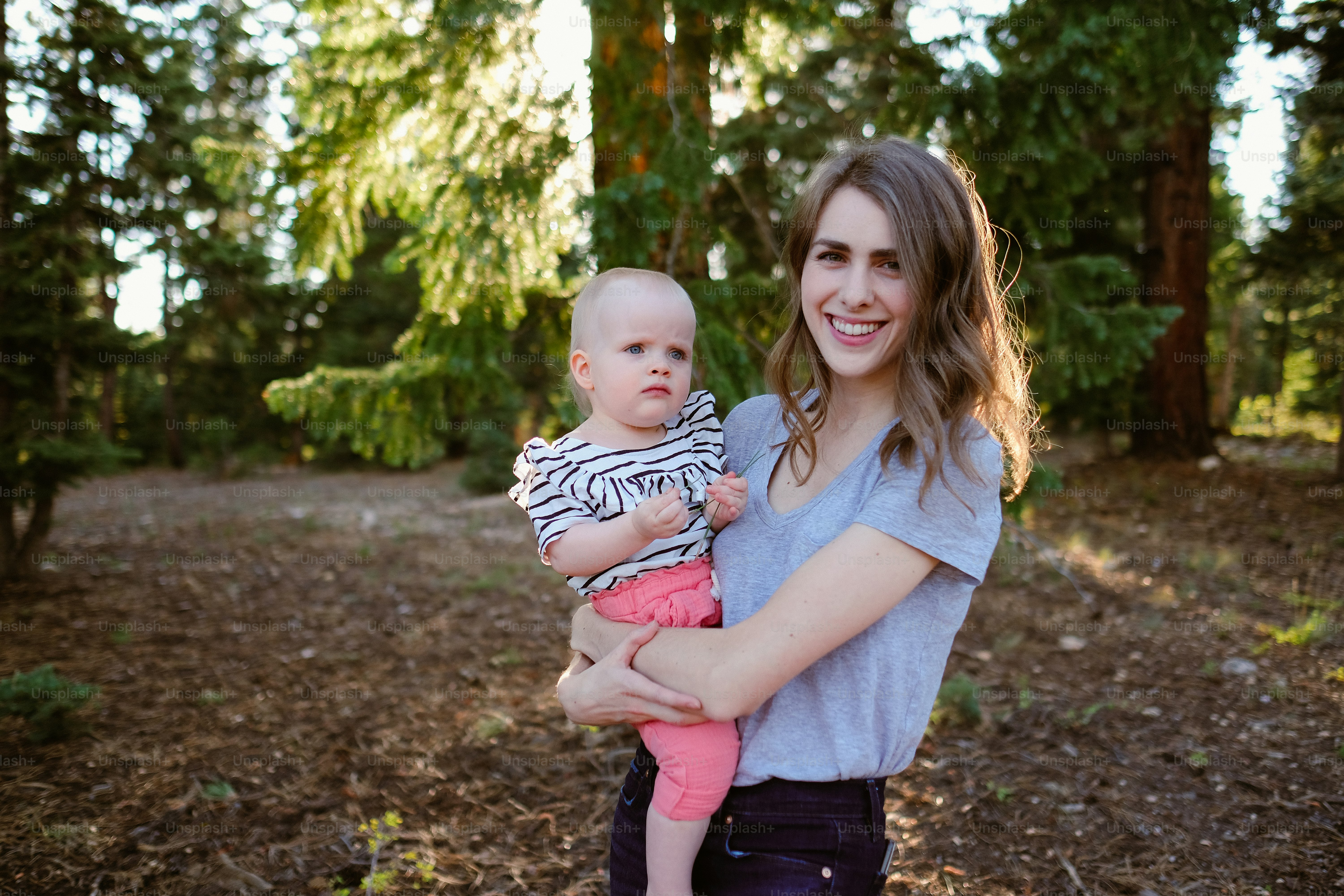 a person holding a baby