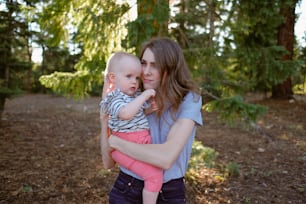 a person holding a baby