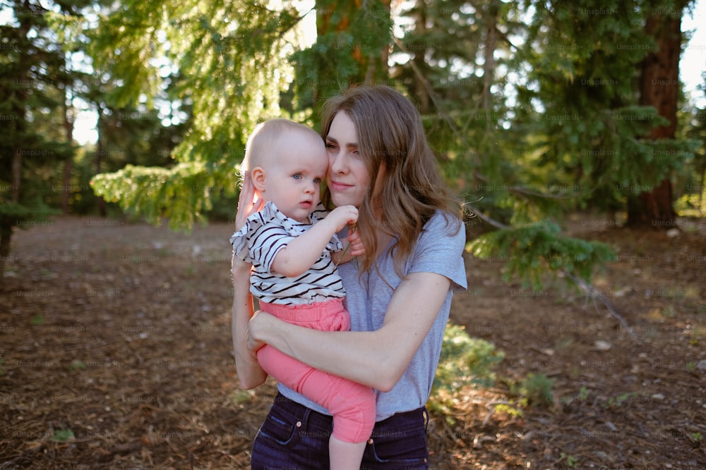 a person holding a baby