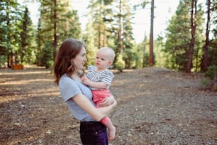 a person holding a baby