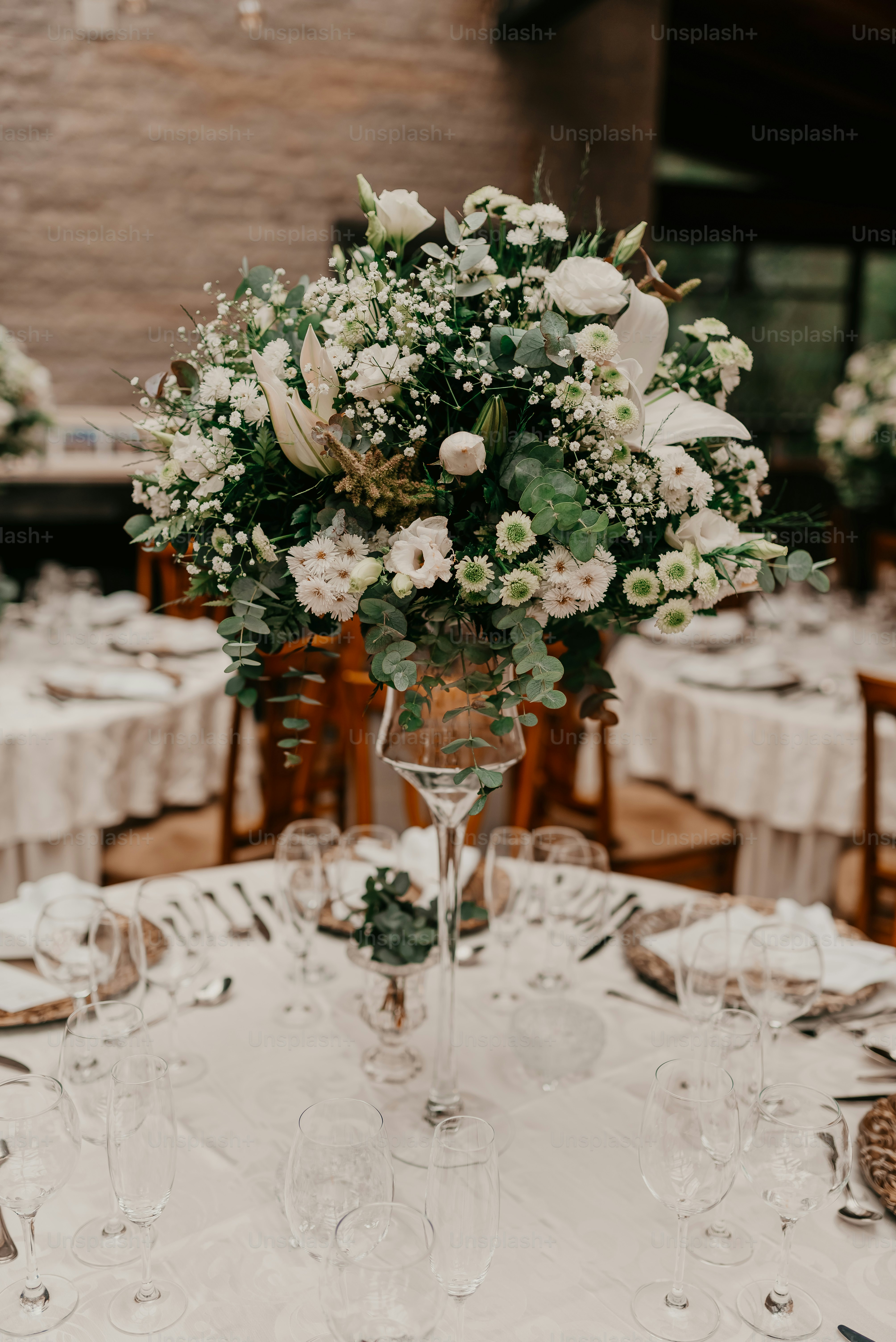 a vase with white flowers