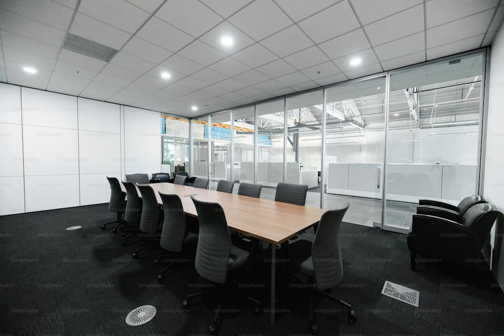 a conference room with a large table and chairs